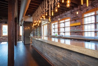 Tinker House Bar Repurposed Flooring and Conveyor Belt