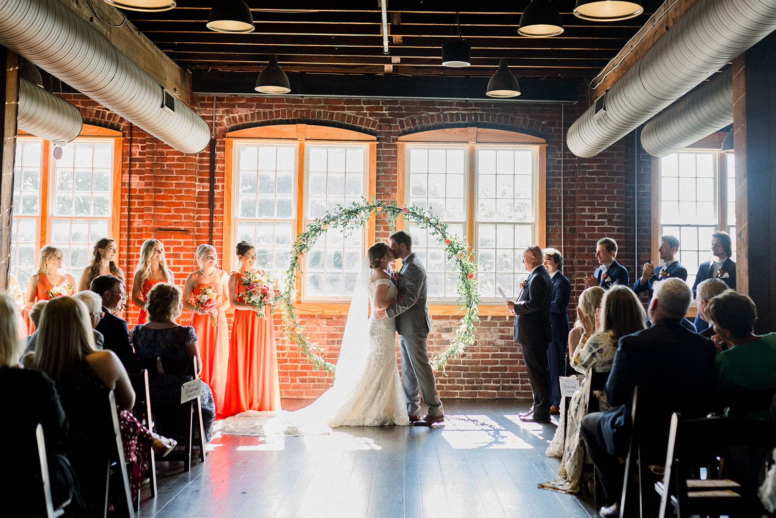 Wedding ceremony setup at Tinker House with natural light and rows of chairs