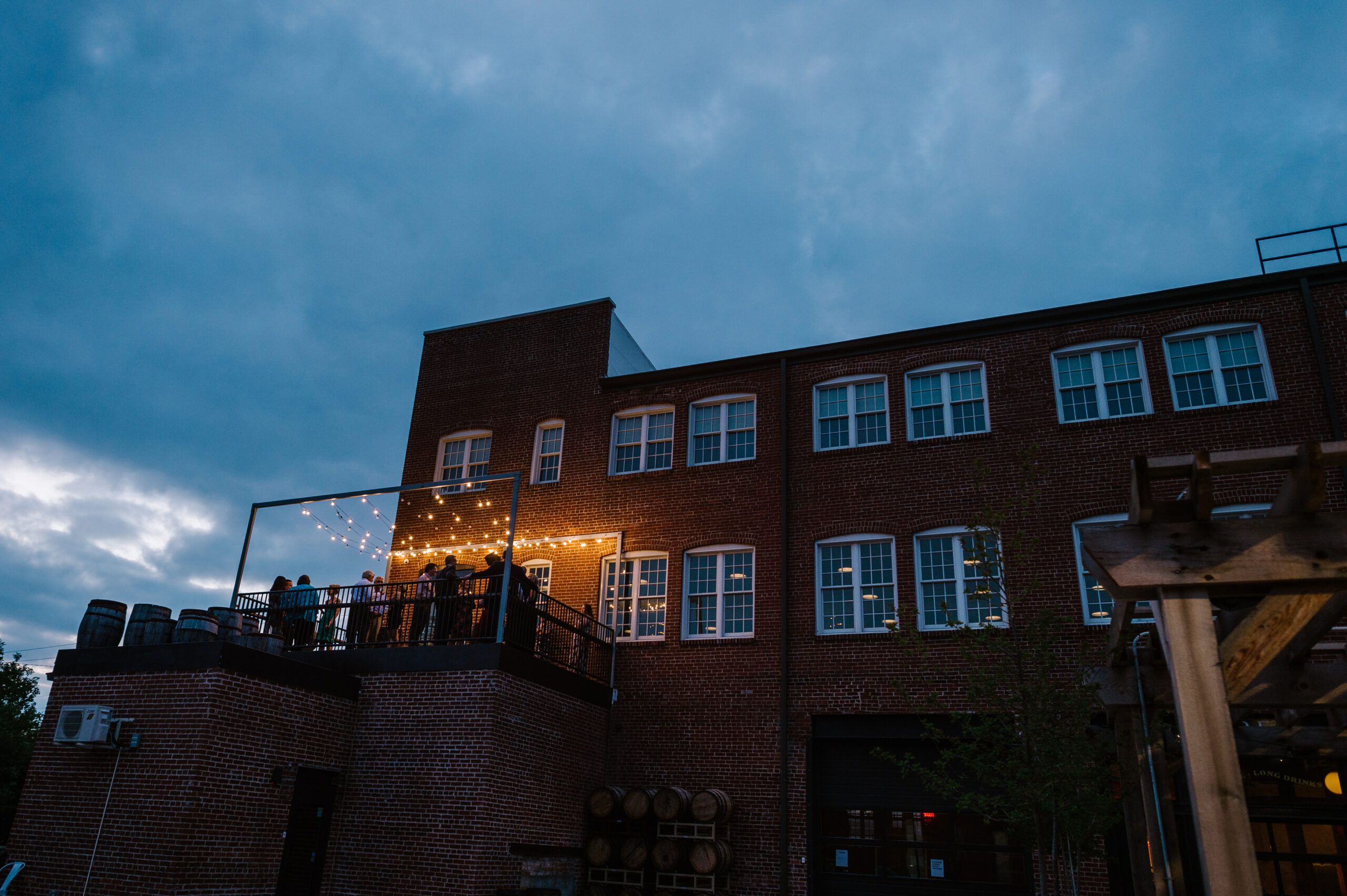  Indianapolis event venue Veranda on the southwest corner of Tinker House with café lights at dusk